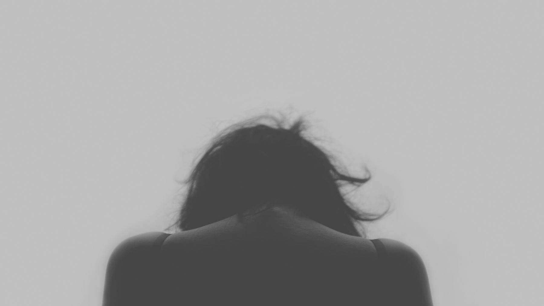 a woman with her back turned back, her back turned to the camera - File:Figure 5. Anxiety can leave